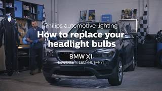 How to replace BMW X1 headlight bulbs [upl. by Balfore200]