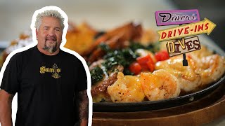 Guy Fieri Eats a Cheesy Shrimp Hot Plate  Diners DriveIns and Dives  Food Network [upl. by Esidarap271]